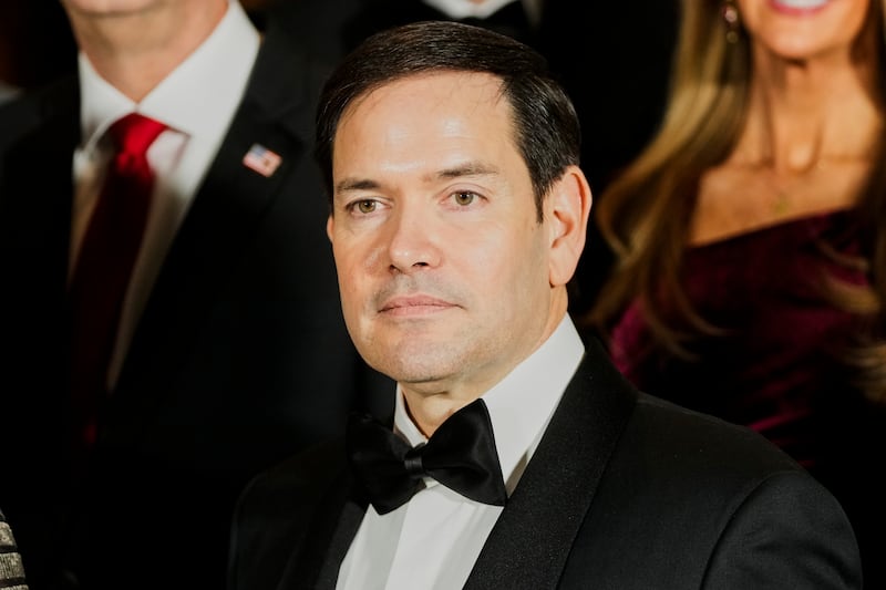 Marco Rubio poses for a photo with Cabinet picks, other nominees and appointments, at the National Gallery of Art in Washington on Saturday (Mark Schiefelbein/AP)