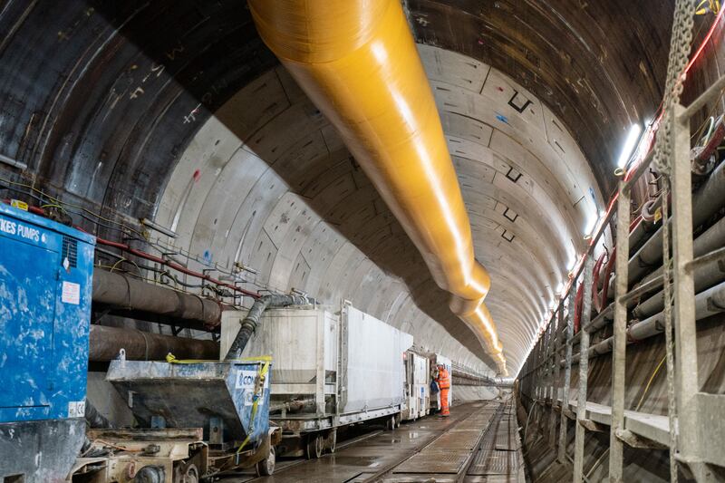 Construction workers in the main tunnel of the Thames Tideway Tunnel