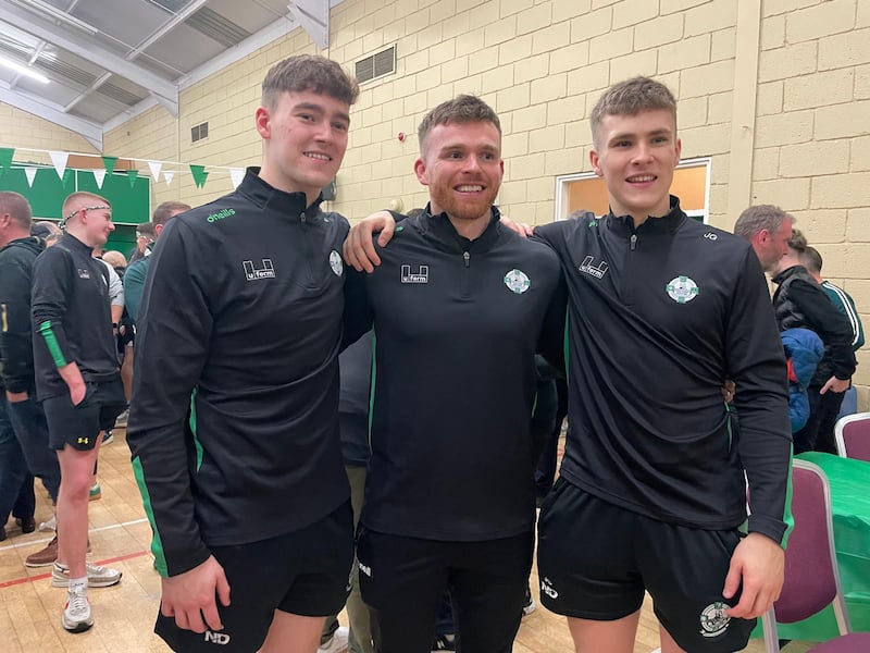 Ciaran Brooks (centre) celebrating back at the club with cousins Tom (left) and James Gribbin (right).