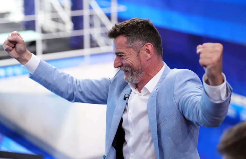 Fred Sirieix, father of Great Britain’s Andrea Spendolini-Sirieix, celebrates as his daughter wins bronze in the 10m synchronised diving