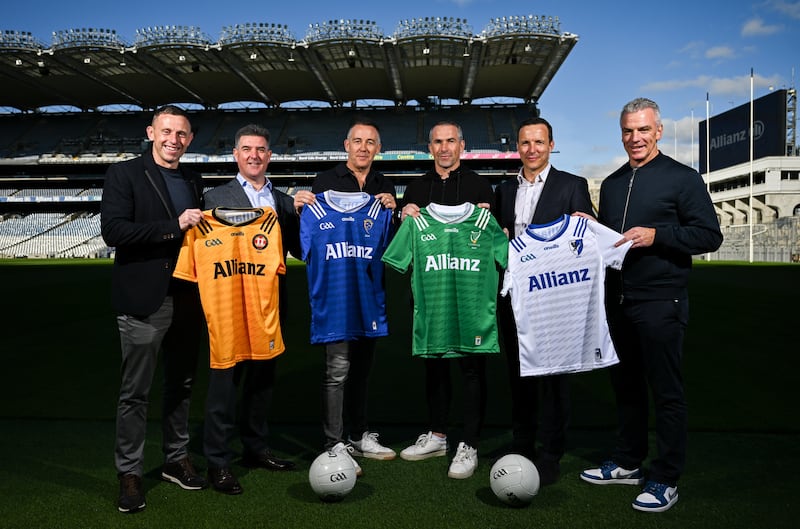 Fermanagh and Ulster manager Kieran Donnelly, Waterford manager and Munster selector Paul Shankey, Former Westmeath manager and current Leinster manager Dessie Dolan and Galway and Connacht manager Padraic Joyce standing on the Croke Park pitch holding their respective province's jersey