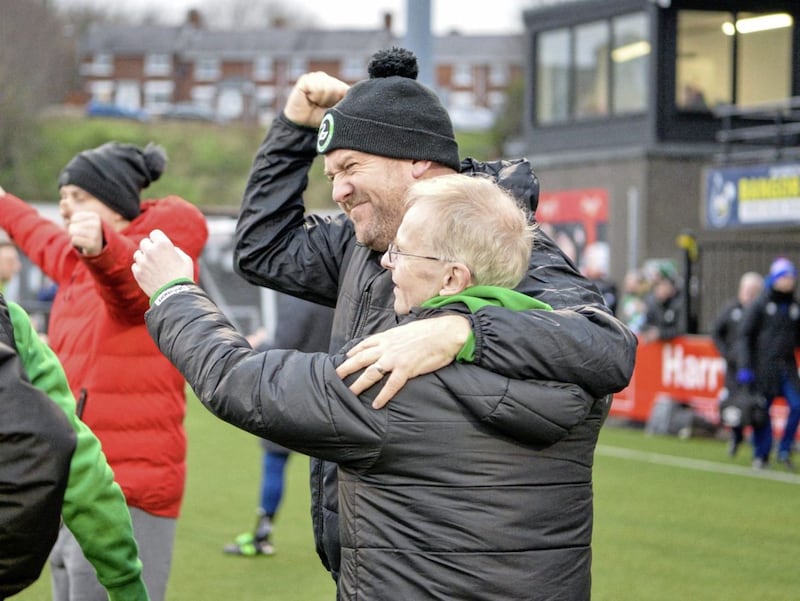 Conor Crossan celebrates being part of the Newington management team to land a second Steel &amp; Sons Cup Picture: Andrew McCarroll/ Pacemaker Press