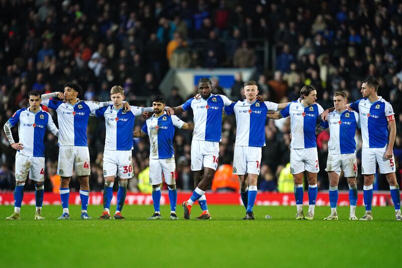 Blackburn Rovers look on during the penalty shoot-out against Newcastle .