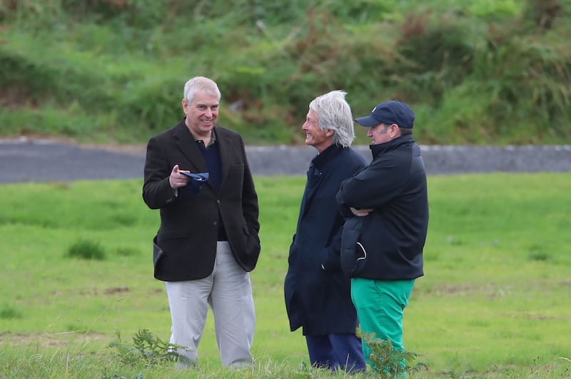 &nbsp;The Duke of York with solicitor Paul Tweed (centre) as he attends The Duke of York Young Champions Trophy at the Royal Portrush Golf Club in County Antrim. Liam McBurney/PA Wire