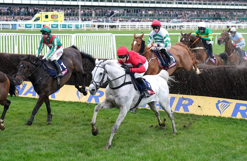 Grey Dawning ridden by Harry Skelton (centre) on their way to winning the Turners Novices' Chase on day three of the 2024 Cheltenham Festival at Cheltenham Racecourse. Picture date: Thursday March 14, 2024.