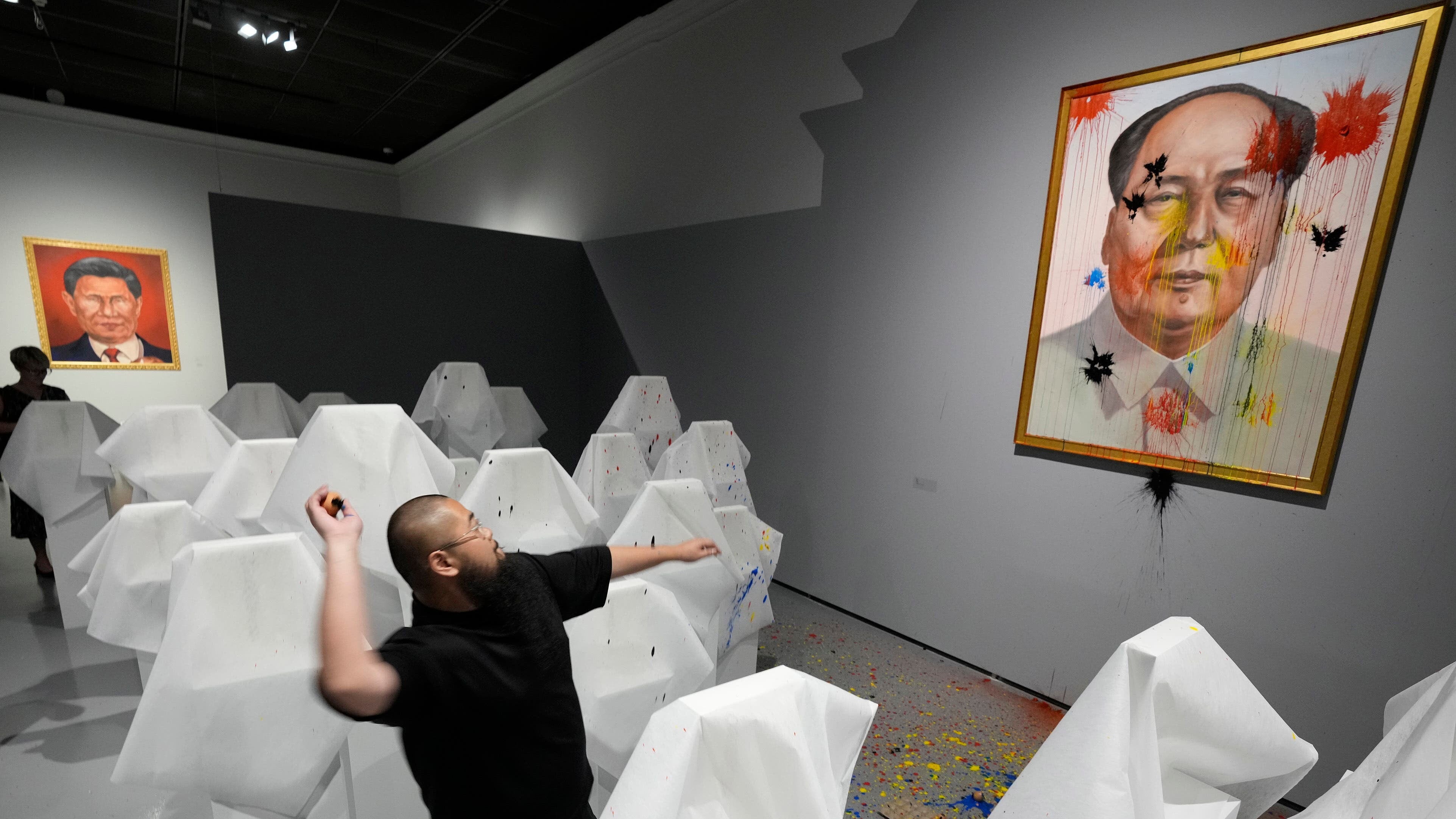 The exhibition by Badiucao is titled Tell China’s Story Well and its promotional image shows Chinese president Xi Jinping eating human flesh.