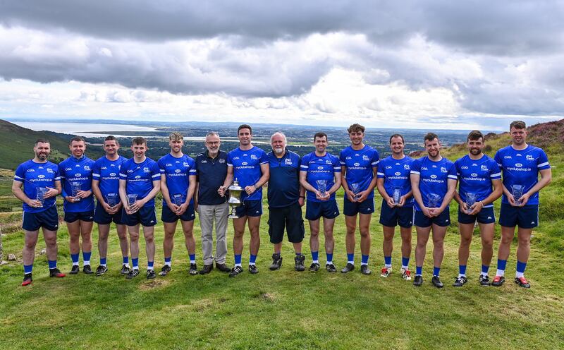 The Senior Hurling participants with GAA President, Larry McCarthy, centre left, and event sponsor Martin Donnelly after the 2023 M. Donnelly GAA All-Ireland Poc Fada Finals at Annaverna Mountain in the Cooley Peninsula, Ravensdale, Louth.