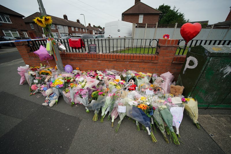 Flowers near the scene in Knotty Ash, Liverpool, where nine-year-old Olivia Pratt-Korbel was fatally shot