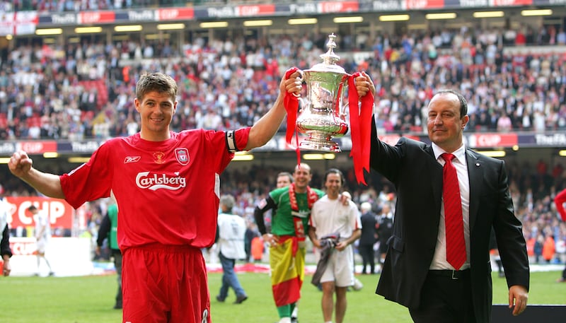 Liverpool captain Steven Gerrard (left) and manager Rafael Benitez celebrated with the FA Cup