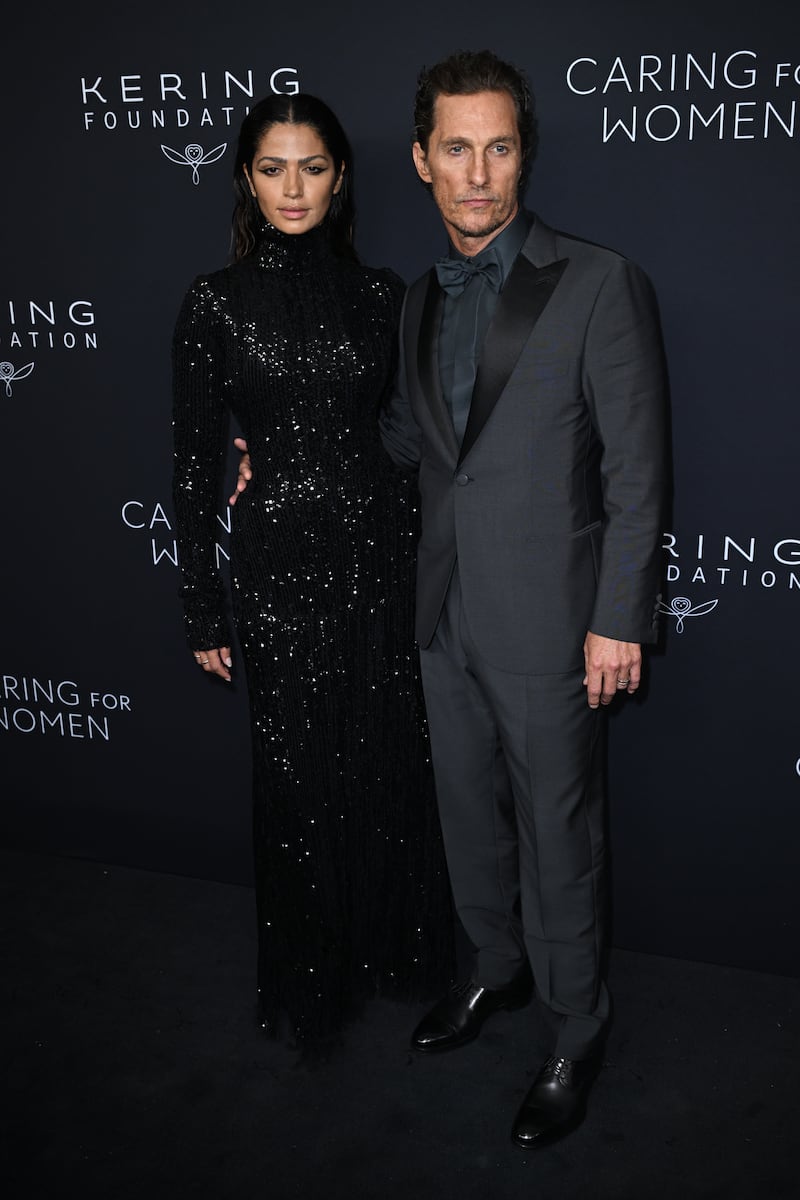 Matthew McConaughey and his wife kept their outfits sombre and muted for the event