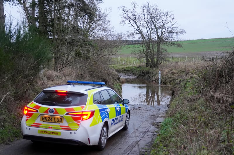 Police at the scene at River Aln near Alnwick, Northumberland