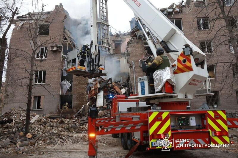 Firefighters work at the site of an apartment building destroyed by a Russian attack in Ukraine (Ukrainian Emergency Service via AP)