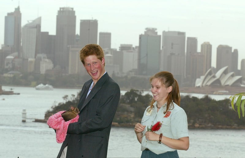 Harry holds a ring-tailed possum at Taronga Zoo in Sydney to mark the start of his gap year in 2003