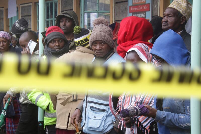 Distressed parents visited the site of the fire (AP)