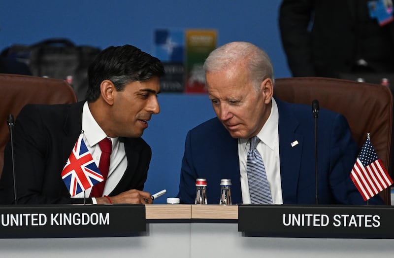 Prime Minister Rishi Sunak, left, and US President Joe Biden (AP)