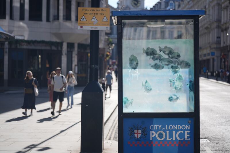 Banksy’s collection included an artwork of a school of fish swimming on a City of London police sentry box