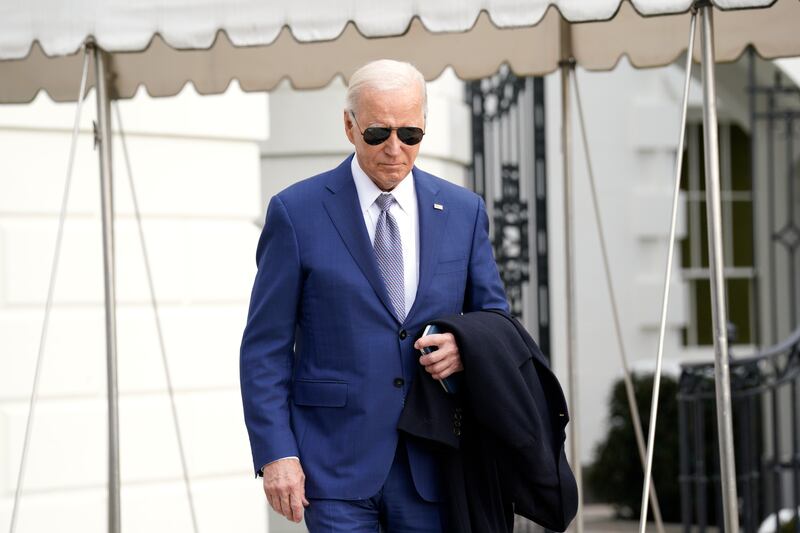President Joe Biden walks to speak to the media before boarding Marine One on the South Lawn of the White House in Washington (Yuri Gripas/AP)