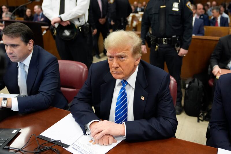 Former president Donald Trump waits for the start of proceedings (Seth Wenig/AP)