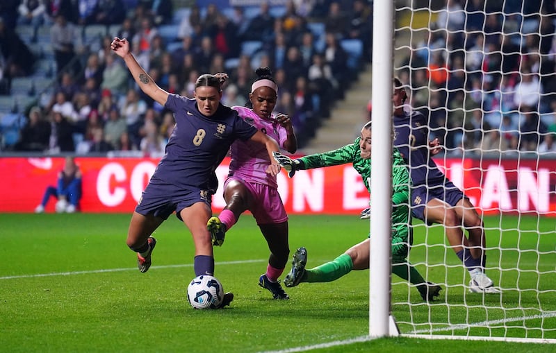 Grace Clinton, left, was one of the players to impress in England’s win