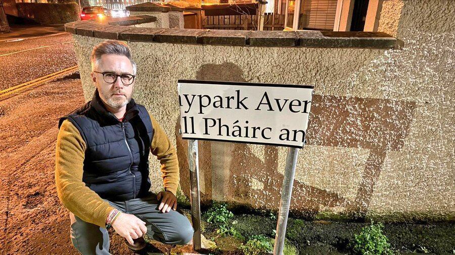 SDLP councillor Gary McKeown at the damaged Haypark Avenue sign in south Belfast. PICTURE: GARY MCKEOWN/X