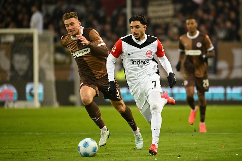 Eintracht Frankfurt forward Omar Marmoush (right) is reportedly a target for City (Gregor Fischer/AP)