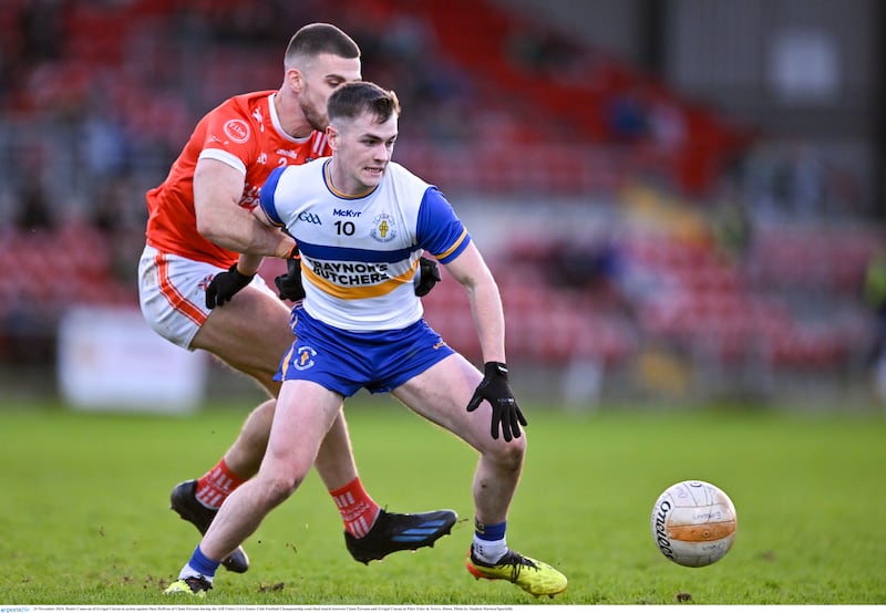 Ruairi Canavan of Errigal Ciaran in action against Shea Heffron of Clann Éireann during the AIB Ulster GAA Senior Club Football Championship semi-final match between Clann Éireann and Errigal Ciaran at Páirc Esler in Newry, Down. Photo by Stephen Marken/Sportsfile