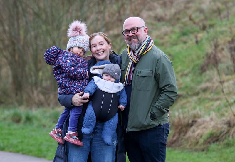 Jonathan and Kathy Porter who met threw a running club,  with Children Louisa and Fionn.
PICTURE COLM LENAGHAN