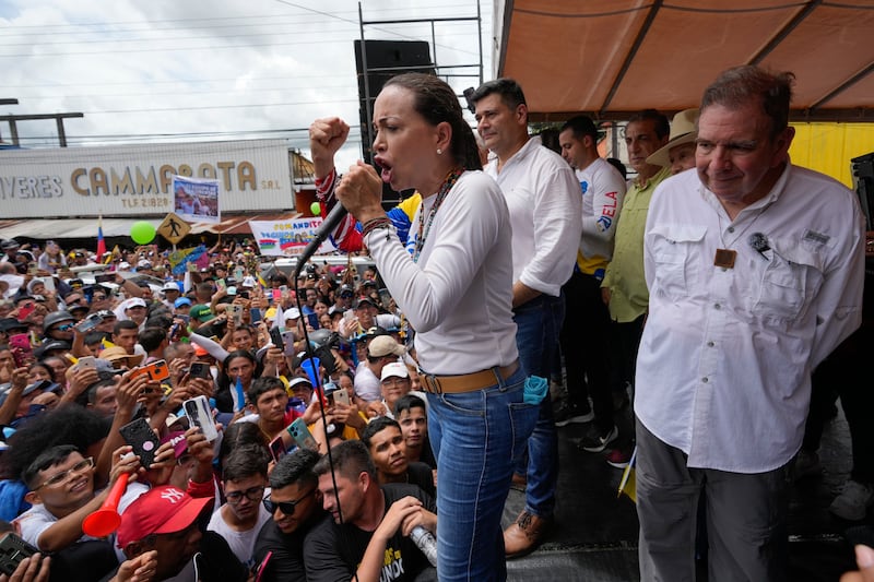 Opposition leader Maria Corina Machado speaks during a campaign rally (Ariana Cubillos/AP)