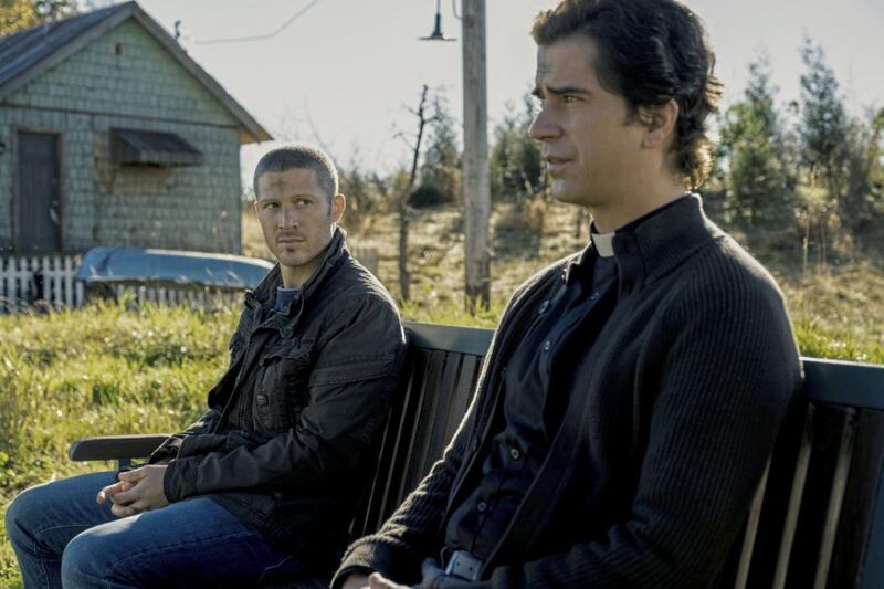 Midnight Mass: Zach Gilford as Riley Flynn and Hamish Linklater as Father Paul 