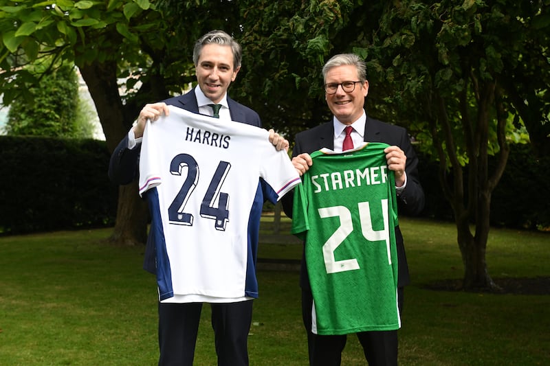 Taoiseach Simon Harris and Prime Minister Sir Keir Starmer swapped personalised jerseys