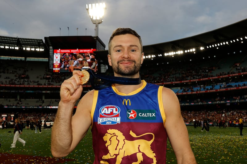 MELBOURNE, AUSTRALIA - SEPTEMBER 28: Conor McKenna of the Lions celebrates after the AFL Grand Final match between Sydney Swans and Brisbane Lions at Melbourne Cricket Ground, on September 28, 2024, in Melbourne, Australia. (Photo by Darrian Traynor/AFL Photos/via Getty Images)