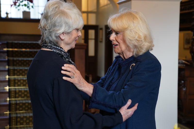 Queen Camilla (right) meets Diana Parkes CBE who founded Joanna Simpson Foundation