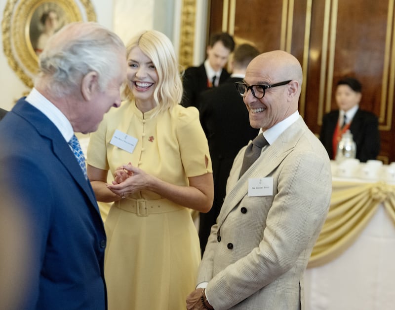 The King meets the then-Prince’s Trust celebrity ambassadors Stanley Tucci and Holly Willoughby at Buckingham Palace