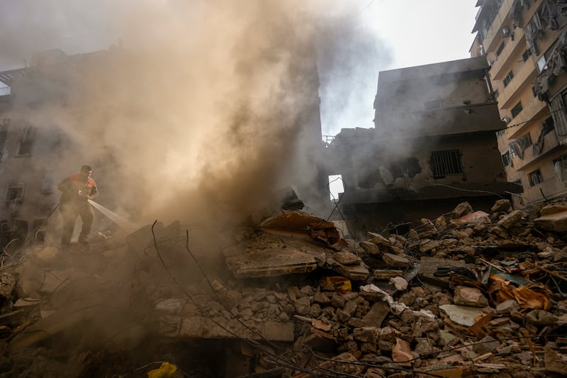 Hezbollah says its strikes were in retaliation for two strikes in Beirut (Hassan Ammar/AP)