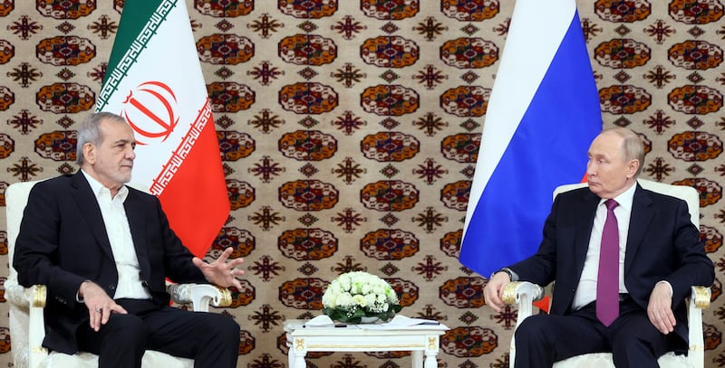 Russian President Vladimir Putin listens to Iranian President Masoud Pezeshkian (Alexander Shcherbak, Sputnik, Kremlin Pool Photo via AP)