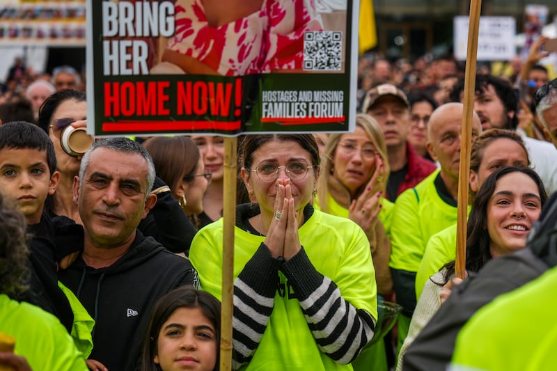 Relatives and friends of Israeli people killed and abducted by Hamas and taken into Gaza, follows the news of the hostages’ release in Tel Aviv (Ariel Schalit/AP)