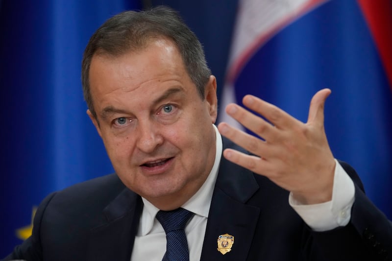 Serbian interior minister Ivica Dacic said police are working to identify all the perpetrators, who will face charges (Darko Vojinovic/AP)