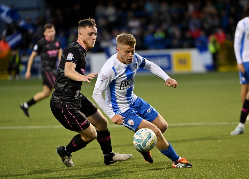 Coleraine’s  Lyndon Kane  in action with Ballymena’s  Calvin McCurry  

PICTURE: Inpho/Stephen Hamilton