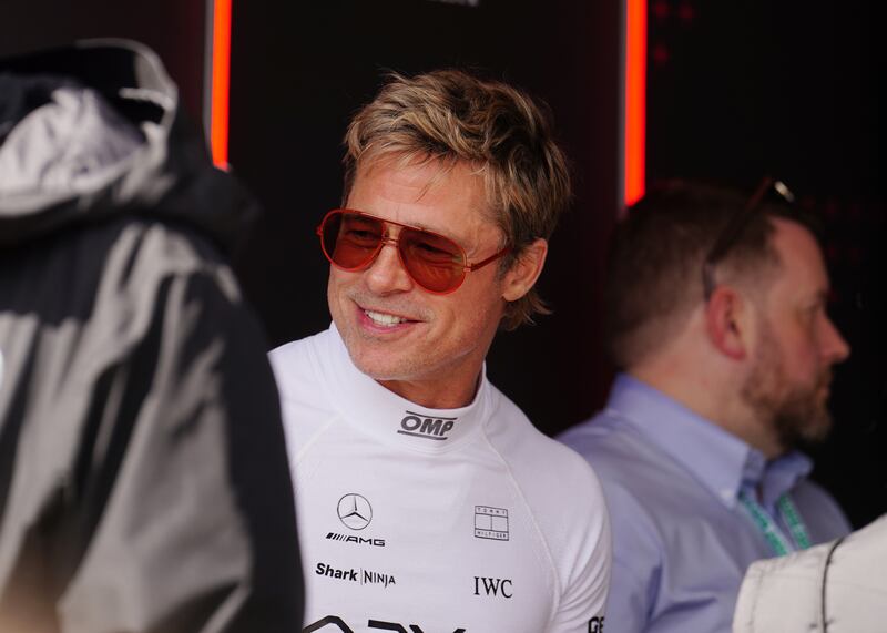 Brad Pitts looks on during qualifying for the British Grand Prix at Silverstone Circuit