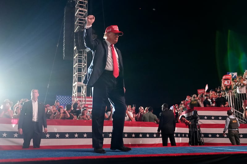 Republican presidential nominee former President Donald Trump gestures to the audience as he departs a campaign rally at the Calhoun Ranch in Coachella, California (Alex Brandon/AP)