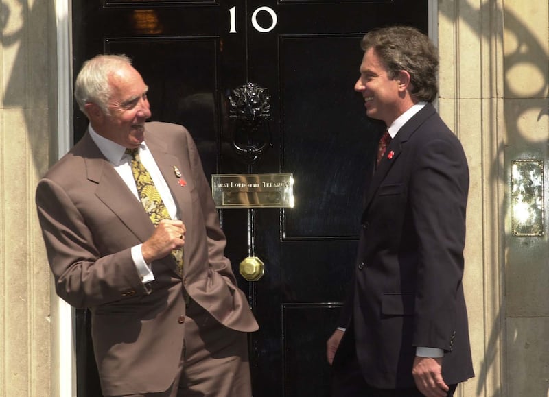 Actor Sir Nigel Hawthorne, who played Sir Humphrey Appleby in Yes, Minister and Yes, Prime Minister with then-PM Tony Blair outside Downing Street