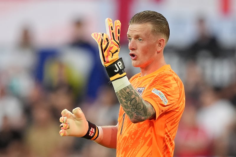 England goalkeeper Jordan Pickford gestures during the Euro 2024 clash with Slovenia