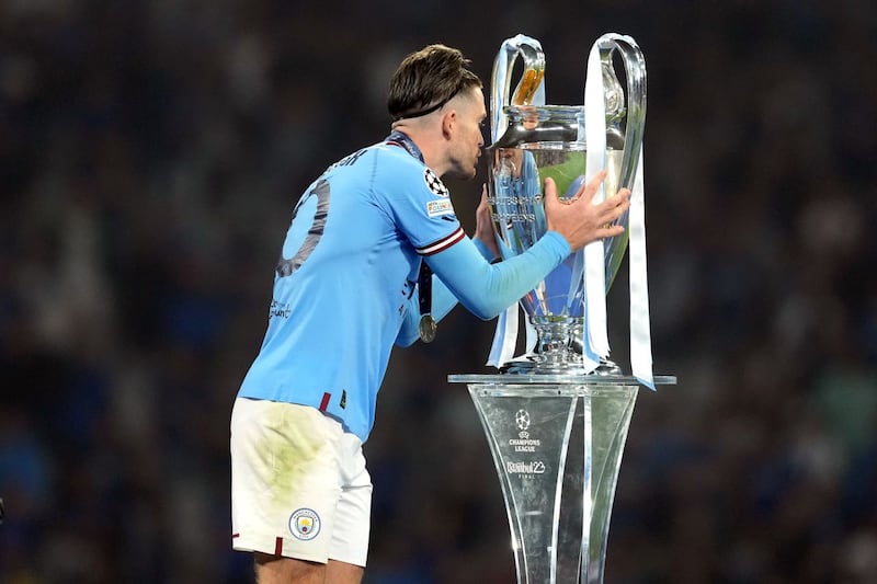 Jack Grealish celebrates Manchester City’s Champions League win