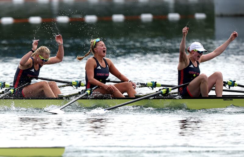 PARIS, FRANCE - JULY 31: Lauren Henry, Hannah Scott, Lola Anderson and Georgina Brayshaw of Team Great Britain celebrate winning the gold medals after competing in the Rowing Women's Quadruple Sculls Final A on day five of the Olympic Games Paris 2024 at Vaires-Sur-Marne Nautical Stadium on July 31, 2024 in Paris, France. (Photo by Francois Nel/Getty Images)