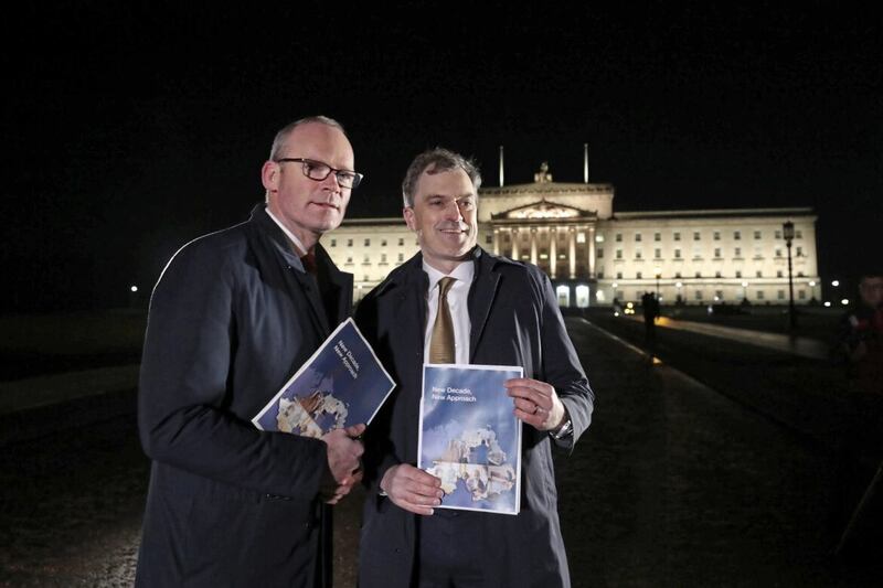 Then Irish Foreign Affairs minister Simon Coveney (left) and Secretary of State Julian Smith announce the New Decade, New Approach agreement in January 2020 