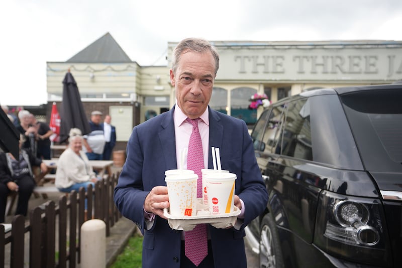 Mr Farage later posed with a tray of McDonalds banana milkshakes in Jaywick, Essex