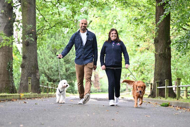 Rosie’s Trust ambassador, and Q Radio presenter, Ibe Sesay, with his dog, Barney, together with the charity’s Operations Manager, Jayne McStay, and Callie.