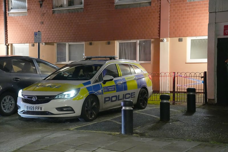 Police officers attend the scene in Shirley Road