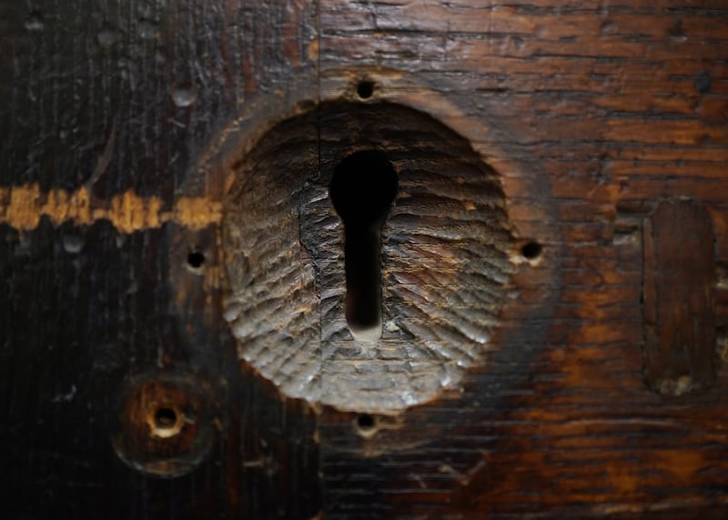 Detail of the keyhole of the Newgate Prison door, described by Charles Dickens as a heavy oaken gate, bound with iron, studded with nails guarded by a turnkey