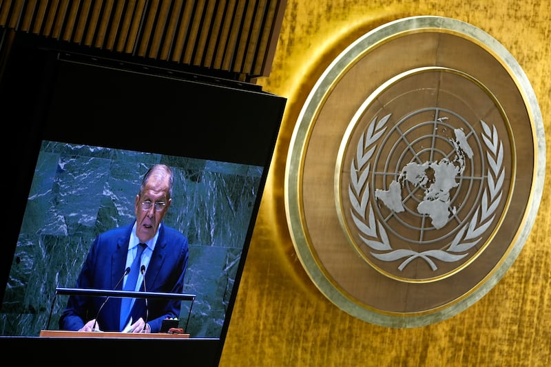 Sergei Lavrov appears on a TV screen as he addresses the 79th session of the UN General Assembly